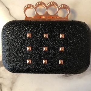 Rihanna Rogue clutch bag